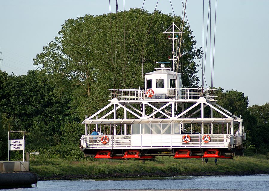 Ferry suspended from bridge